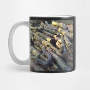 Felled wood in a forest Mug